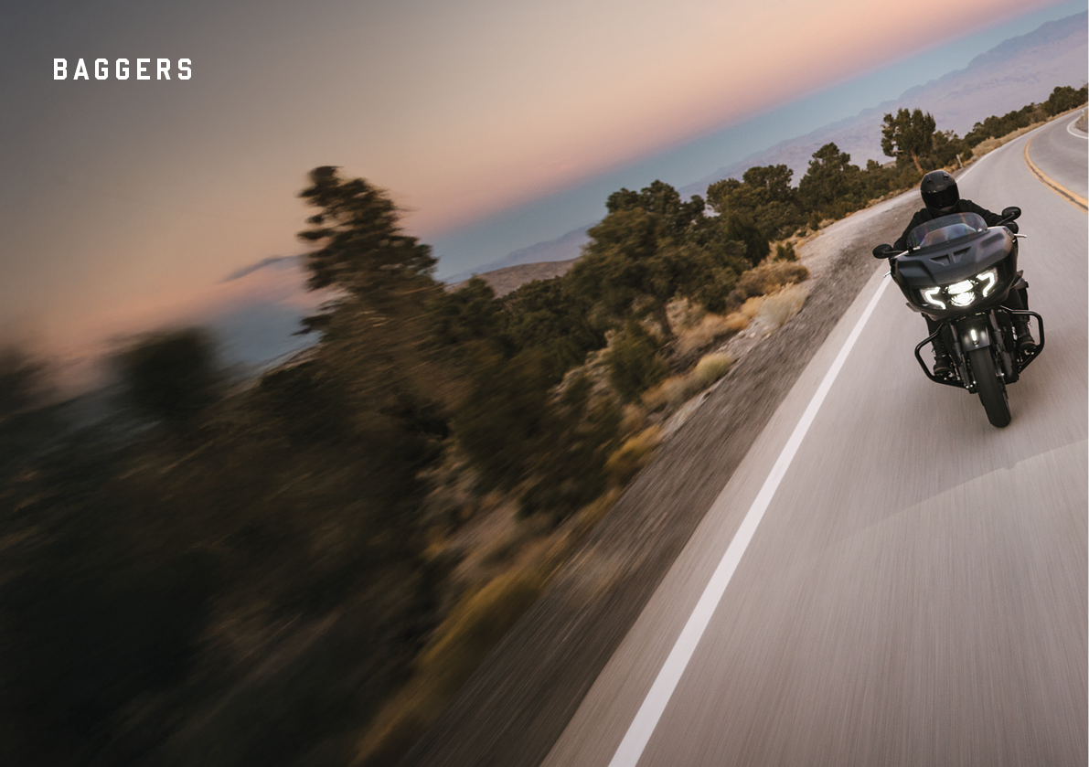 A man riding a motorcycle on a road with trees in the background. AI generated content